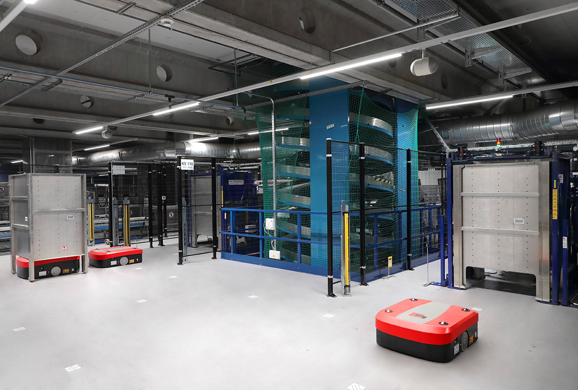 Automated guided vehicles transport boxes